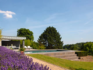 Sportlicher Gartenpool im Bergischen, Hesselbach GmbH Hesselbach GmbH Modern Garden Stone