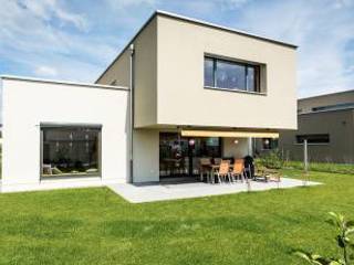 Mükemmel bir aile evi, umit atdağ umit atdağ Case in stile minimalista