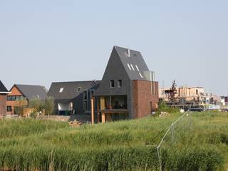 Woning met werkruimte, Homerus kwartier Almere Poort, Architectenbureau Jules Zwijsen Architectenbureau Jules Zwijsen Modern houses