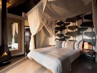 Mhondoro, een Lodge in Zuid-Afrika, All-In Living All-In Living Dormitorios de estilo moderno