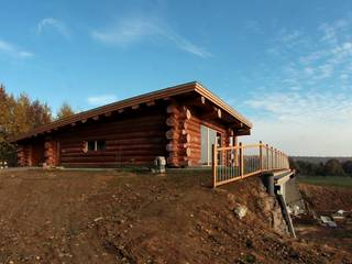 Nadbudowa Grzegorzowice, Organica Design & Build Organica Design & Build Rustic style houses Wood Brown