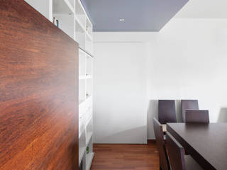 Apartamento Terraços da Ponte, Estúdio AMATAM Estúdio AMATAM Eclectic style living room