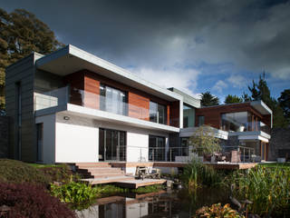 Garden house Set in lush 3 acre site within an Area of Townscape Character, Des Ewing Residential Architects Des Ewing Residential Architects Casas modernas