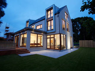 A collection of four contemporary Iroko timber-clad modern family homes, Des Ewing Residential Architects Des Ewing Residential Architects Будинки