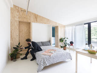 Batipin flat: Piccolo monolocale di 28 mq, studio wok studio wok Moderne Schlafzimmer