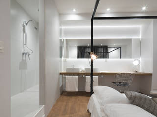 Oficina convertida en apartamento de alquiler en Rambla de Catalunya, JEEV ARQUITECTURA JEEV ARQUITECTURA Camera da letto moderna