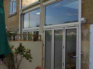 Side return extensions Style Within Modern conservatory Aluminium/Zinc White side return,extension,powder coated aluminium,bifold doors,glazed extension,patio doors,glass facade,garden room