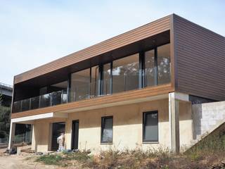 Casa de madeira em Aveiro com tempo de contrução de 3 meses e meio, Lethes House Lethes House Casas modernas Madera Acabado en madera