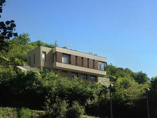 Maison d'Architecte, IND Architecture IND Architecture Casa unifamiliare Legno massello Variopinto