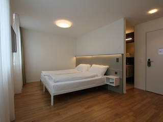 Contract - Camere Hotel Flawil, Svizzera, iCarraro iCarraro Minimalist bedroom Aluminium/Zinc