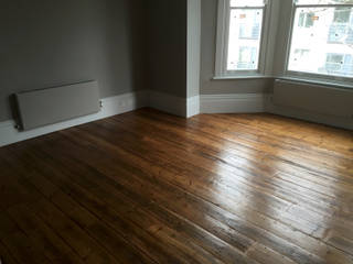 Reclaimed Pine floorboards, The British Wood Flooring Company The British Wood Flooring Company ห้องนั่งเล่น