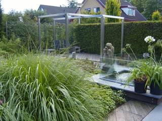 Moderne tuin met pergola van rvs, Joke Gerritsma Tuinontwerpen Joke Gerritsma Tuinontwerpen Moderner Garten