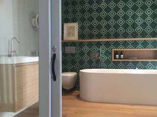A White House in Exterior, Meets with Colors in Interior, Etienne Hanekom Interiors Etienne Hanekom Interiors Modern Bathroom Green