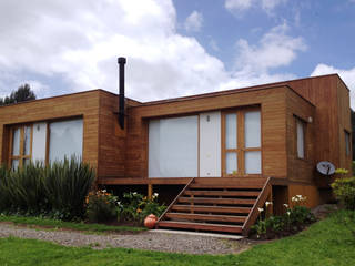 Casa cubica madera, Taller de Ensamble SAS Taller de Ensamble SAS Rumah Modern Kayu Wood effect