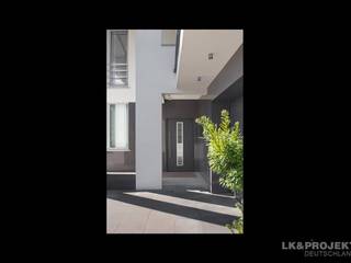 Wem gefällt unser Projekt LK&769? Diese schicke Villa ist schon fertig., LK&Projekt GmbH LK&Projekt GmbH Modern Houses