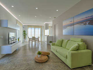 Villa: Una forte relazione tra gli ambienti interni e il paesaggio, DFG Architetti Associati DFG Architetti Associati Modern living room Concrete