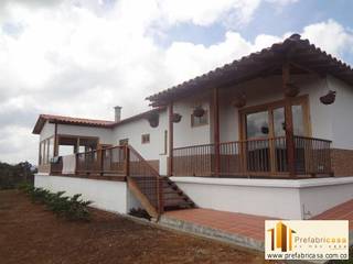 Casa Prefabricada en Bogota, PREFABRICASA PREFABRICASA Rustic style houses