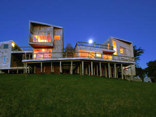 Casa Muelle, Jonás Retamal Arquitectos Jonás Retamal Arquitectos Landhäuser Holz Holznachbildung