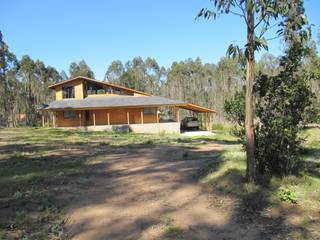 Vivienda Lehmann, Proyecto ARQ Proyecto ARQ Rustic style house Wood Wood effect