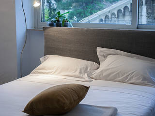 Camera da letto, Arch. Vittoria Ribighini Arch. Vittoria Ribighini Modern style bedroom