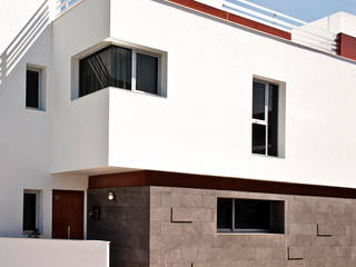 Edificio Catalina, Morada arquitectura e interiorismo Morada arquitectura e interiorismo Casas de estilo moderno Piedra