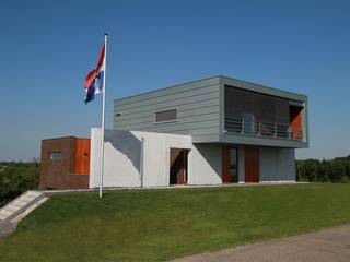 Moderne dijkwoning Box on the Wa(a)ll, Brand I BBA Architecten Brand I BBA Architecten บ้านและที่อยู่อาศัย