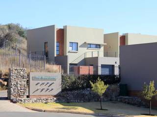 The Boulders Townhouses, XO Architects Inc. XO Architects Inc. モダンな 家