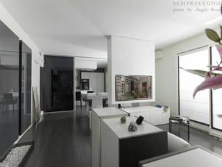 Interni di Design: Loft moderno arredato su misura con mobili realizzati dalla Falegnameria Semprelegno, Semprelegno Semprelegno Soggiorno minimalista