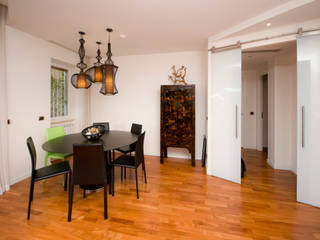 Ristrutturazione appartamento 130 mq, Fabiola Ferrarello Fabiola Ferrarello Comedores de estilo ecléctico Derivados de madera Transparente