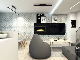 Minimalistyczne wnętrze z przewagą bieli i czerni, MONOstudio MONOstudio Soggiorno minimalista