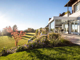 Sommergarten in Kirchschlag bei Linz mit Schibeelementen von Sunflex und Dachgläsern aus Sicherheitsglas, Schmidinger Wintergärten, Fenster & Verglasungen Schmidinger Wintergärten, Fenster & Verglasungen Modern Kış Bahçesi Aluminyum/Çinko