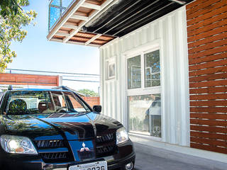 Residencial de Casas Container I | Campeche, Florianópolis (SC), GhiorziTavares Arquitetura GhiorziTavares Arquitetura Maisons minimalistes Fer / Acier