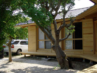 大工棟梁と造る家, 環アソシエイツ・高岸設計室 環アソシエイツ・高岸設計室 Asian style garden Wood Multicolored
