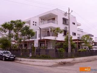 Bungalow At Ahmadabad, ni3design ni3design Casas modernas
