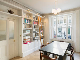 View of library Gundry & Ducker Architecture Comedores de estilo ecléctico library ladder,bookshelves