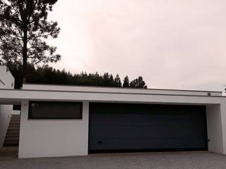 garagem e churrasqueira, Emprofeira - empresa de projectos da Feira, Lda. Emprofeira - empresa de projectos da Feira, Lda. Moderne Garagen & Schuppen Ziegel