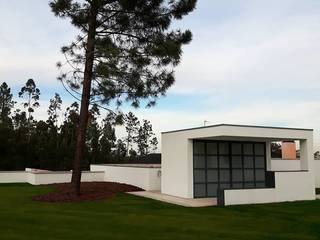 garagem e churrasqueira, Emprofeira - empresa de projectos da Feira, Lda. Emprofeira - empresa de projectos da Feira, Lda. Casas modernas Tijolo