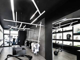 Cómo iluminar una tienda de moda, el retail lighting, iLamparas.com iLamparas.com 모던스타일 미디어 룸