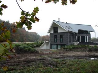 Modern Landhuis, Architectenbureau Jules Zwijsen Architectenbureau Jules Zwijsen Modern home