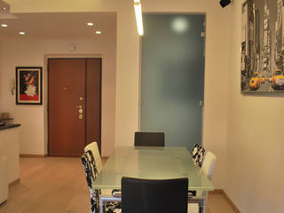 Appartamento a Villa Bonelli - Roma, PROGETTO MULTIMEDIA DESIGN PROGETTO MULTIMEDIA DESIGN Modern dining room Glass