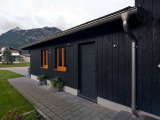 Harley Davidson zu Hause, w. raum Architektur + Innenarchitektur w. raum Architektur + Innenarchitektur Casas de estilo ecléctico