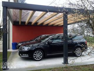 Carport con copertura in policarbonato, Ideal Ferro snc Ideal Ferro snc Garajes y galpones de estilo moderno Hierro/Acero