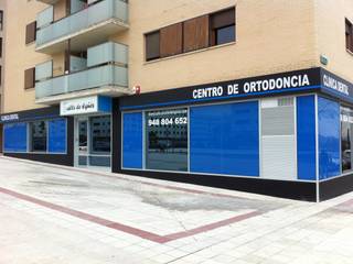 Clinica dental en Sarriguren, Muneta Arquitectura S.L.P. Muneta Arquitectura S.L.P. Casas modernas: Ideas, imágenes y decoración Vidrio