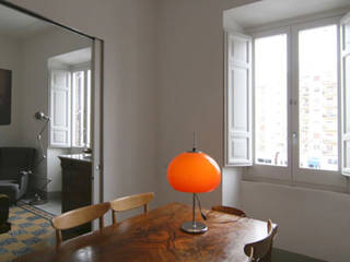 La casa dei binari, Laura Pistoia architetto Laura Pistoia architetto Eclectic style dining room