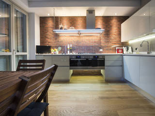 Una cucina in stile industriale con i mattoni faccia a vista Genesis, B&B Rivestimenti Naturali B&B Rivestimenti Naturali Cucina in stile industriale Laterizio Rosso