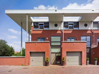 aaneen gesloten woningbouw, G.L.M. van Soest Architect G.L.M. van Soest Architect Casas modernas