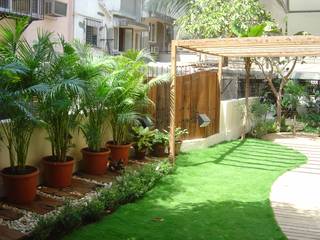 Garden landscape for Bungalow at Chembur , Land Design landscape architects Land Design landscape architects Tropical style garden