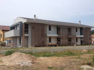 Home, la più bella casa del quartiere, italedil srl italedil srl Modern Houses Engineered Wood Transparent