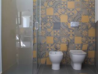 Stanza da bagno in cementine decorate, Romano pavimenti Romano pavimenti Eclectic style bathrooms