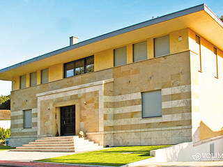 Fassadengestaltung als Putzfassade, Volimea GmbH & Cie KG Volimea GmbH & Cie KG Moderne Häuser Bernstein/Gold